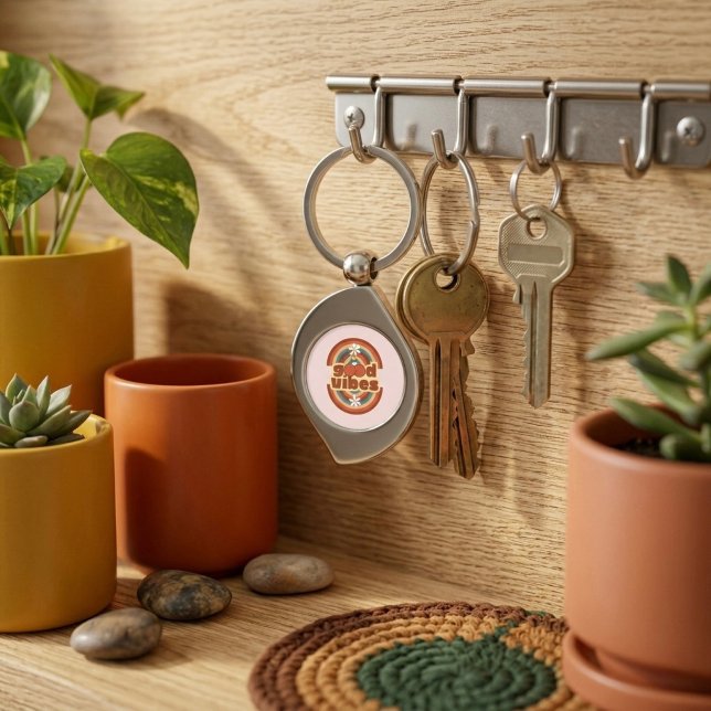 Bra Vibbar Swirl Silverfärgad Nyckelring (Skapare uppladdad)