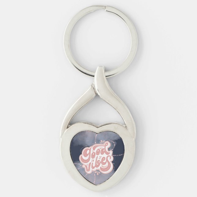 Bra Vibbar Twisted Heart Silverfärgad Nyckelring (Framsidan)