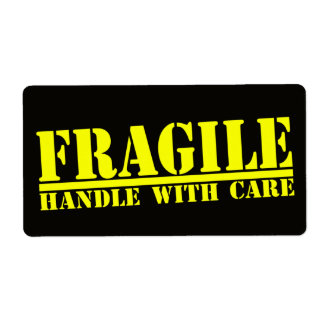 Bräcklig handtag med vårdetikett fraktsedel