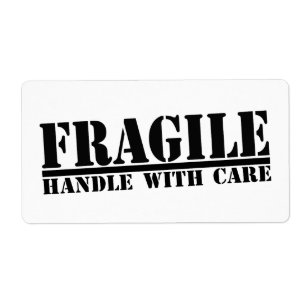 Bräcklig handtag med vårdetiketter fraktsedel