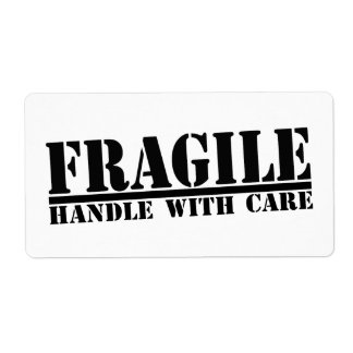 Bräcklig handtag med vårdetiketter fraktsedel