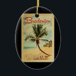 Bradenton Handflatan Träd Vintage resor Julgransprydnad Keramik<br><div class="desc">En unik kopia av den moderna tidningen Bradenton Florida i vintage resor poster stil. Den har en böjd handflatan träd på sandstranden med hav under ett blått grumligt himlar.</div>