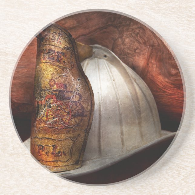 Brandman - avfyrachefen underlägg sandsten (Framsidan)