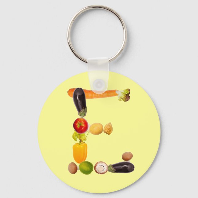 brev (E) av frukt och grönsaker Nyckelring (Framsida)