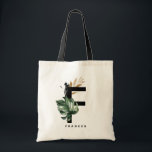 Brev F Monogram | Tropiska monstera-Personligen Tygkasse<br><div class="desc">Anpassade brev F monogram till en väska med vattenfärg montera löv,  faux guld foil löv och svarta vattenfärgshålstensaccenter. Anpassa det tropiska monogrammet till väskan genom att lägga till ditt namn eller annan information. Den här boho brev F-monogrammet till väskan blir perfekt som gåva. Andra brev finns tillgängliga.</div>