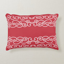 Brickrött med vita scrollsar prydnadskudde