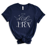 Bride Era Bröllop T-shirt<br><div class="desc">Gå in i din speciella dag med stil och flair på vår Bride Era T-shirt! Den är utformad med mjuk, bekväm väv och försedd med elegant Bride Era-design, det är perfekten för möhippor, möhippor eller helt enkelt firar din förlovning. Visa upp din möhippa med den här chicen och den här...</div>