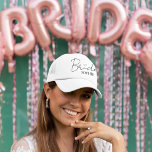 Bride Personalized Bachelorette Party Cap Keps<br><div class="desc">Celebrate the bride-to-be with this chic and fun personalized trucker hat — the perfect accessory for bachelorette parties, beach getaways, and wedding prep! Featuring a modern script "Bride" with heart detail and a customizable name, this lightweight and breathable cap keeps her stylish and sun-safe. Available in a variety of colors...</div>