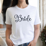 Bride Script Heart White Bachelorette T Shirt<br><div class="desc">En modern design för bruden. Den snabba bruden i ord har ett hjärta och kommer säkert att uppmärksammas vid en biverkning. Kan användas till repetitionsmiddag och med din bröllopsfest.</div>