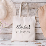 Bridesmaid Modern Minimalist Script Bachelorette Tygkasse<br><div class="desc">Höj din bachelorette-fest med vår "Bridesmaid Modern Minimalist Script"-samling. Denna utsökta produktlinje förkroppsligar contemporaryns elegans och tidlös stil, perfekt för att fira dina kommande påhitt på ett modernt och sofistikerat sätt. Vårt minimalistiska skript utformar ställe dina brudar i förgrunden och lägger till en kursgrej till varje inslag. Oavsett om det...</div>
