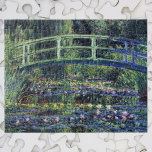 Bridge over Waterlily Pond av Claude Monet Pussel<br><div class="desc">Claude Monets brygga över Waterlily Pond är en vintage bra konsthantmålning med en bro över vattenfyllda blommor i en damm i Monets trädgård i hans hem i Giverny, Frankrike. Claude Monet tyckte om att måla "en plein luft" eller "på öppet luft". En serie över 250 blommålningar som Monet målade under...</div>