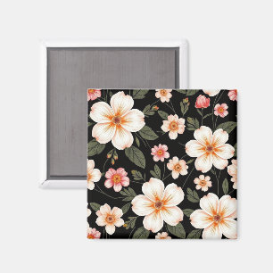 Bright-blommönster på svart magnet