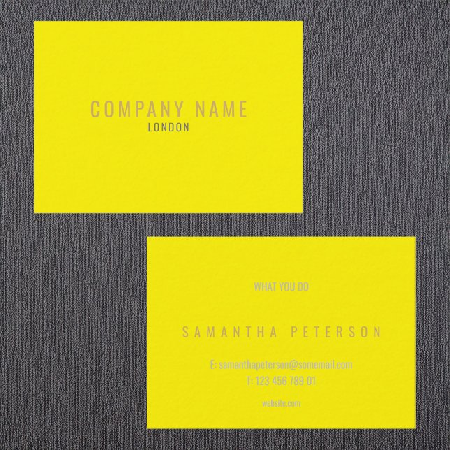 Bright gult, neon och guld visitkort (Bright yellow neon and gold business card.)
