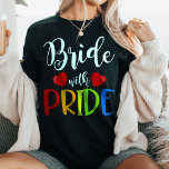 Brista med Pride LGBTQ  Bröllop T Shirt<br><div class="desc">Firar kärlek och jämlikhet med den vackra "Bride with Pride" t-shirt! Perfekt för HGBTQ  bröllop och firande i kärlek,  den här skjortan har en pulserande regnbågsdesign och det skarpa budskapet "Bride with Pride". Visa ert stöd för jämlikhet i giftermål och bära pridet på din sleeve!</div>