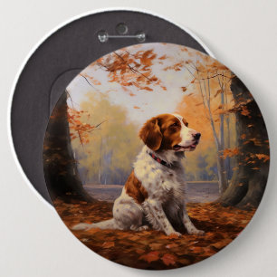 Brittany Spaniel i höstlöv hösten inspirerar Knapp