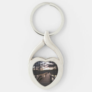 Bro till mitt hjärta twisted heart silverfärgad nyckelring