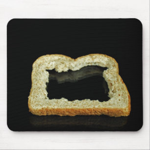 Bröd crust på svart musmatta