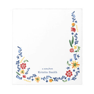 Broderad blommigt anteckningsblock