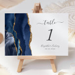 Bröllop för marinblått Guld Agate Bordsnummer<br><div class="desc">Det moderna kortet för bordsnummer i bröllop,  som är lämnat kant i eleganten,  har en marin blåfärgad agate i gräns som trimmas med faux guld glitter. Med anpassadet kombineras grått-handskrift med kol och typsnitt med kursiv och sammanstrykning på vit bakgrund.</div>