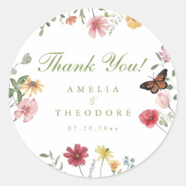 Bröllop i vildblomsterträdgård runt klistermärke