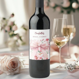 Bröllopsfest med rosa blommor i båge vinflaska etikett
