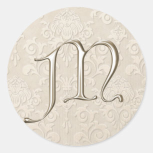 Bröllopsstiftare i silver - brev M Runt Klistermärke