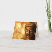 Brons den Buddha statyn med det guld- Bokeh tack