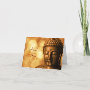 Brons den Buddha statyn med det guld- Bokeh tack Kort
