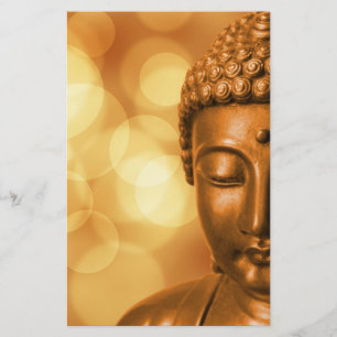 Bronze Buddha Statue med Golden Bokeh Background Brevpapper