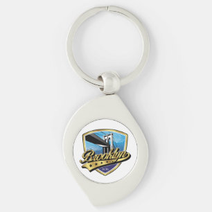 Brooklyn Shield och Swoosh Design Swirl Silverfärgad Nyckelring
