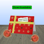 Brother-familjens röda julklapp helgkort<br><div class="desc">God jul för din bror och hans familj. Kortet ser ut som ett skifte med ett färgat mönster av stiliserat snöflingor i gyllene och grönt färg mot röd bakgrund. Paketet är bundet till ett gyllene "band" och har en "gåva"-märkre med budskapet "Julbroder och familj i Lycklig". Anpassadet i texten är...</div>