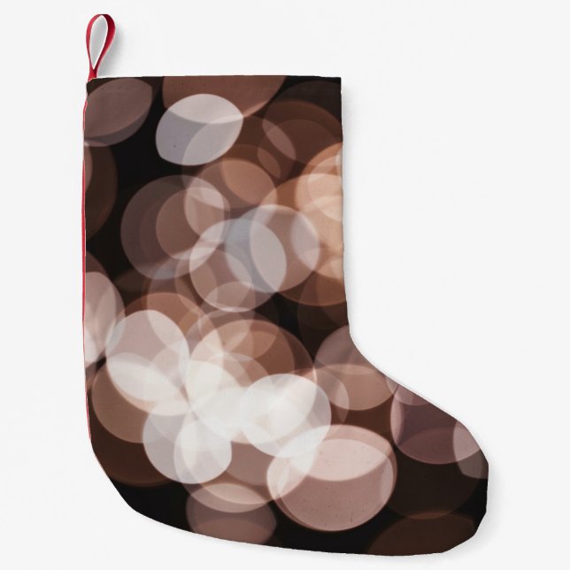 Brown bokeh ljus liten julstrumpa (Framsidan)