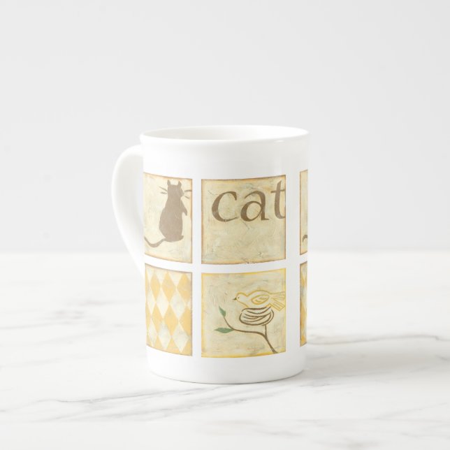 Brown Cat och Gult Bird av Chariklia Zarris Benporslin Mugg (Framsida vänster)