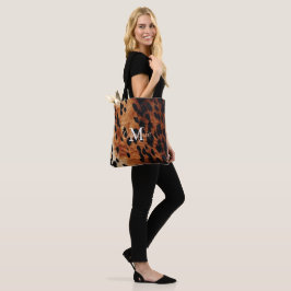 Brown Cowhide Monogram Tygkasse