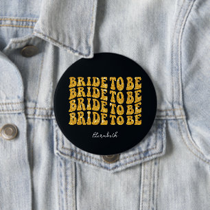 Brud att bli guld glittertext med namn, svart knapp