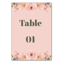 Brudbord med Rosa Persikofärgade Blommor i Vattenf