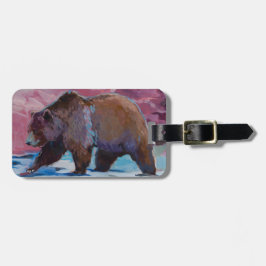 Brun björn i Utah som går vid stenarna Bagagebricka