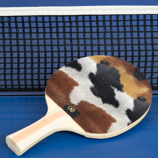 Brun svart och vit ko-hud struktur kastkudde pingisracket (Insitu)