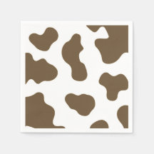 Brun tryckt ko i landlig västern-ridstil till fest