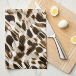 Brun vridande hål i rörelse, mörk och vitaktig kökshandduk