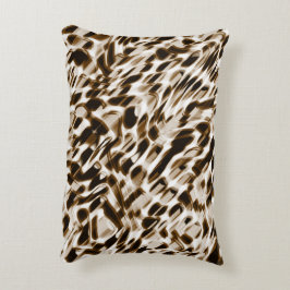 Brun vridande hål i rörelse, mörk och vitaktig prydnadskudde