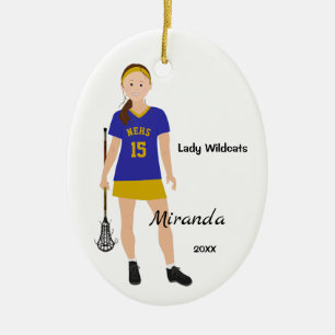 Brunette Female Lacrosse Player i blått och Gult Julgransprydnad Keramik