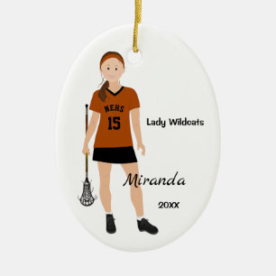 Brunette Lacrosse Player i Orange och svart Julgransprydnad Keramik