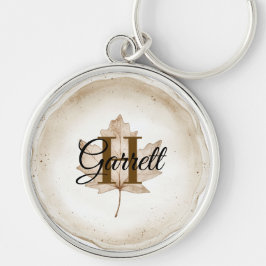 Brunt blad monogramnamn rund silverfärgad nyckelring