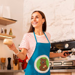 Brunt skal med isgrädde förkläde<br><div class="desc">En brunbjörn som håller en glass med många-skop. Den här designen ser ut att vara verkligen för dessa Apron</div>