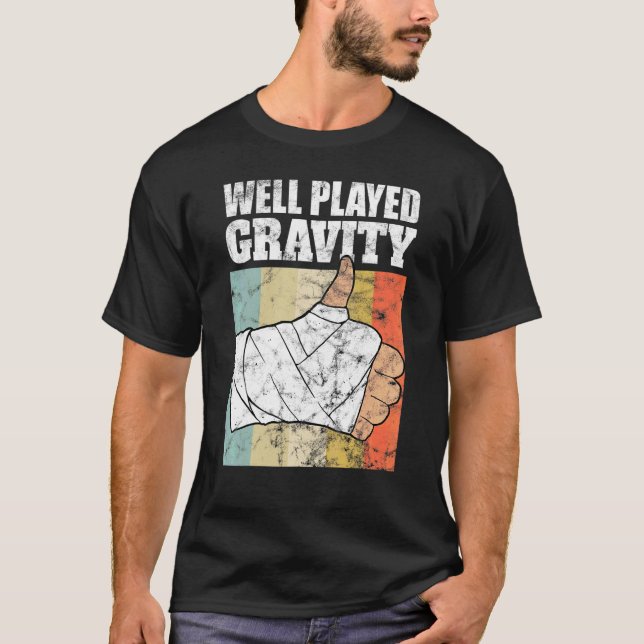 Bruten Arm   Välspelad Gravitation T Shirt (Framsida)