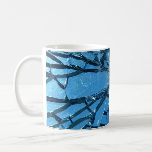 Brutet blått glas kaffemugg (Vänster)