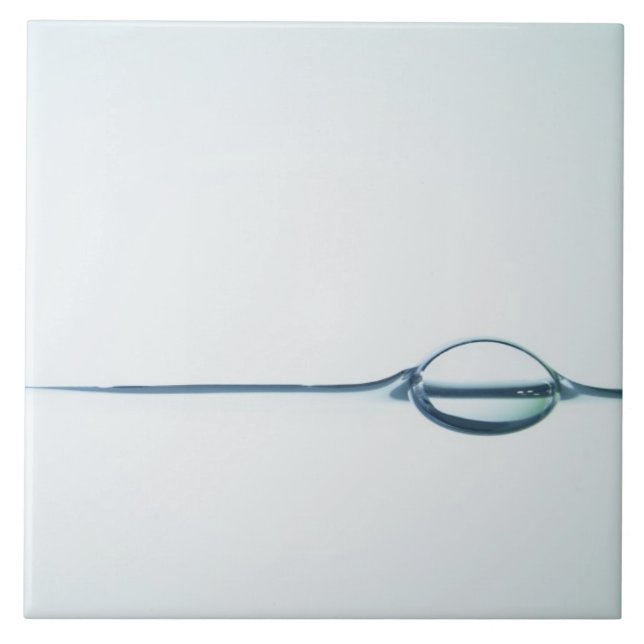 Bubblar på vattenyta kakelplatta (Framsidan)