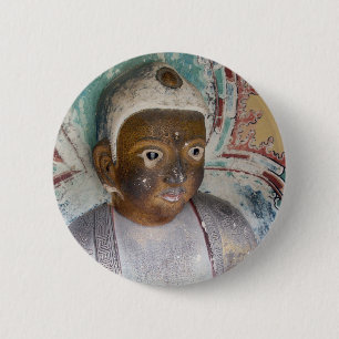 Buddha knäppas knapp