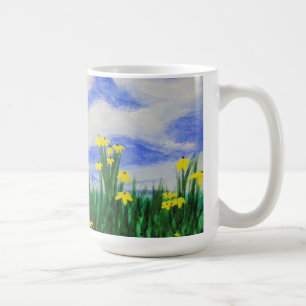 Buktcoven blommar i ett ljust fält kaffemugg